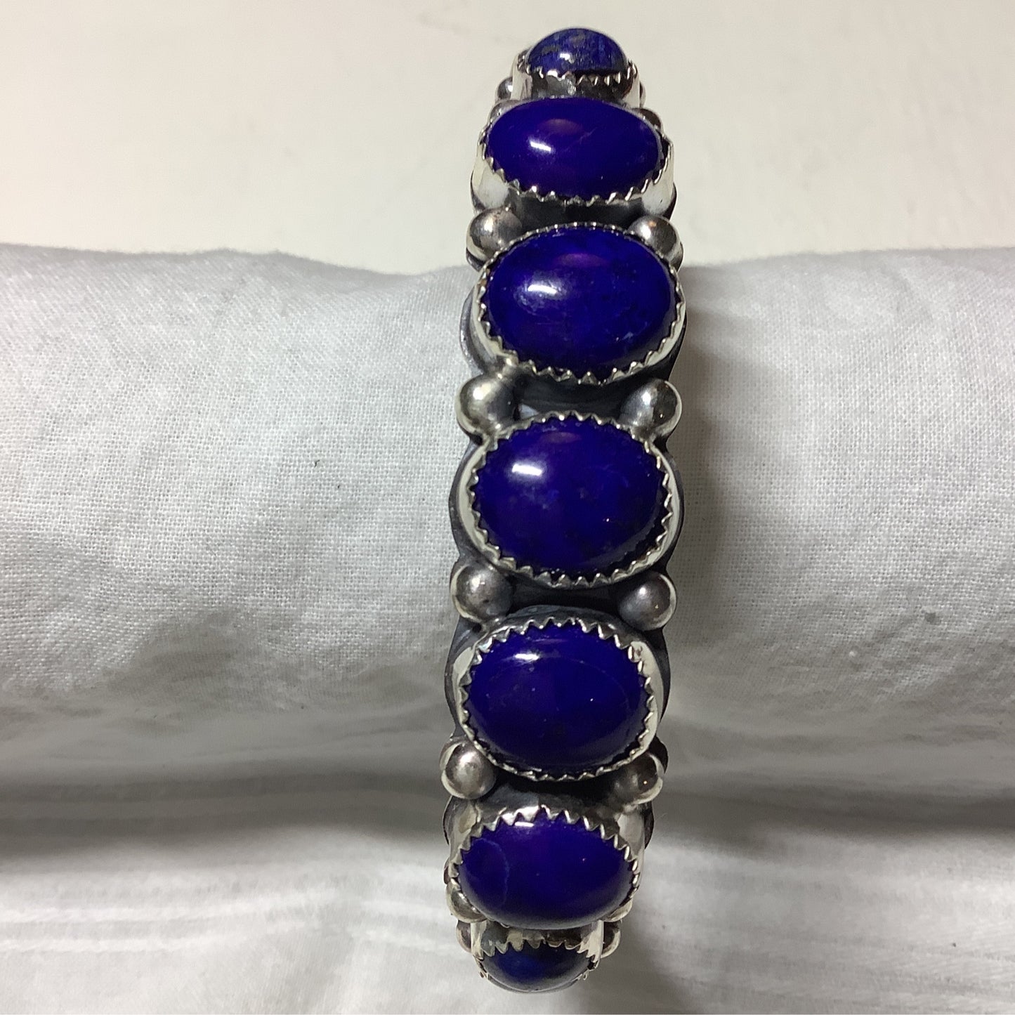 Bracelet, 9-Stone Lapis, sawooth bezel, Wilbur Musket crafted from Sterling Silver, an exquisite Bracelets Native America designed by Turquoise Mustang.