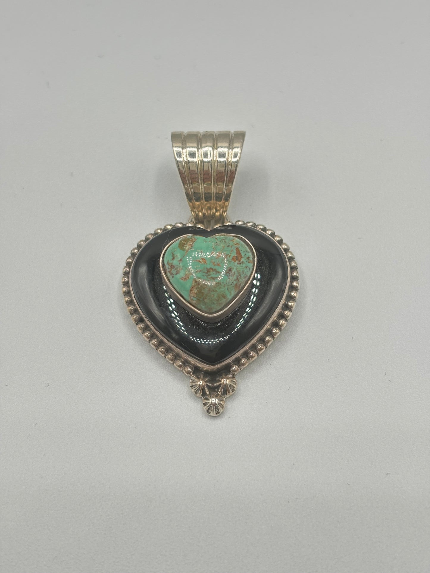 Handcrafted Jewelry Piece crafted from Sterling Silver, an exquisite Jewelry designed by Turquoise Mustang.