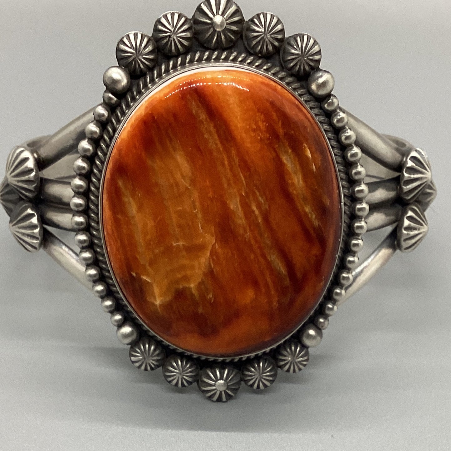 Bracelet, Cuff, Orange Spiny Oyster Rope Bezel, Raindrops, Starbursts, 85 ct, Michael Calditto crafted from Sterling Silver, an exquisite Bracelets Native America designed by Turquoise Mustang.