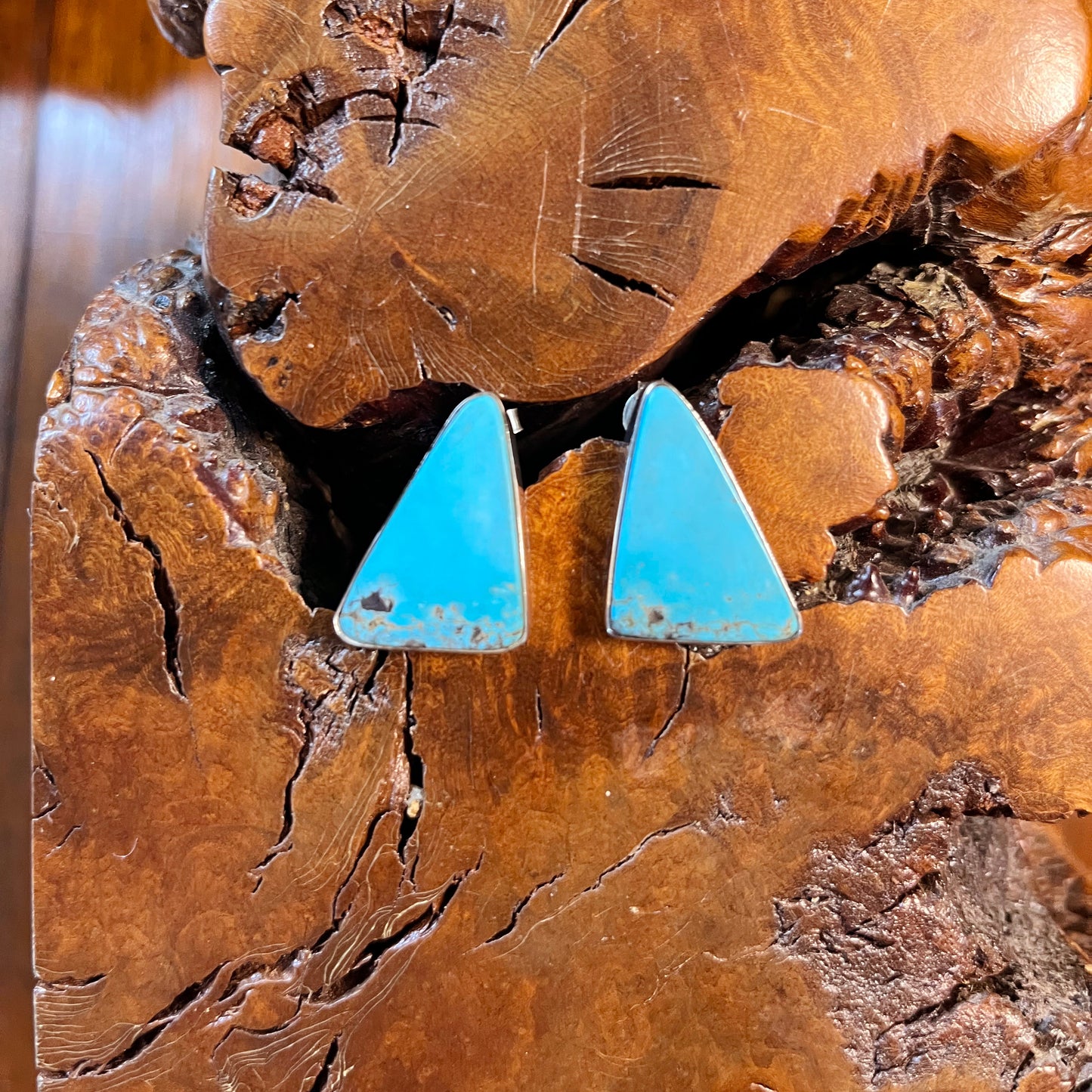 The Trillium Triangle Earrings crafted from Med. Blue Kingman Turquoise, an exquisite Turquoise Mustang Earrings designed by Turquoise Mustang.