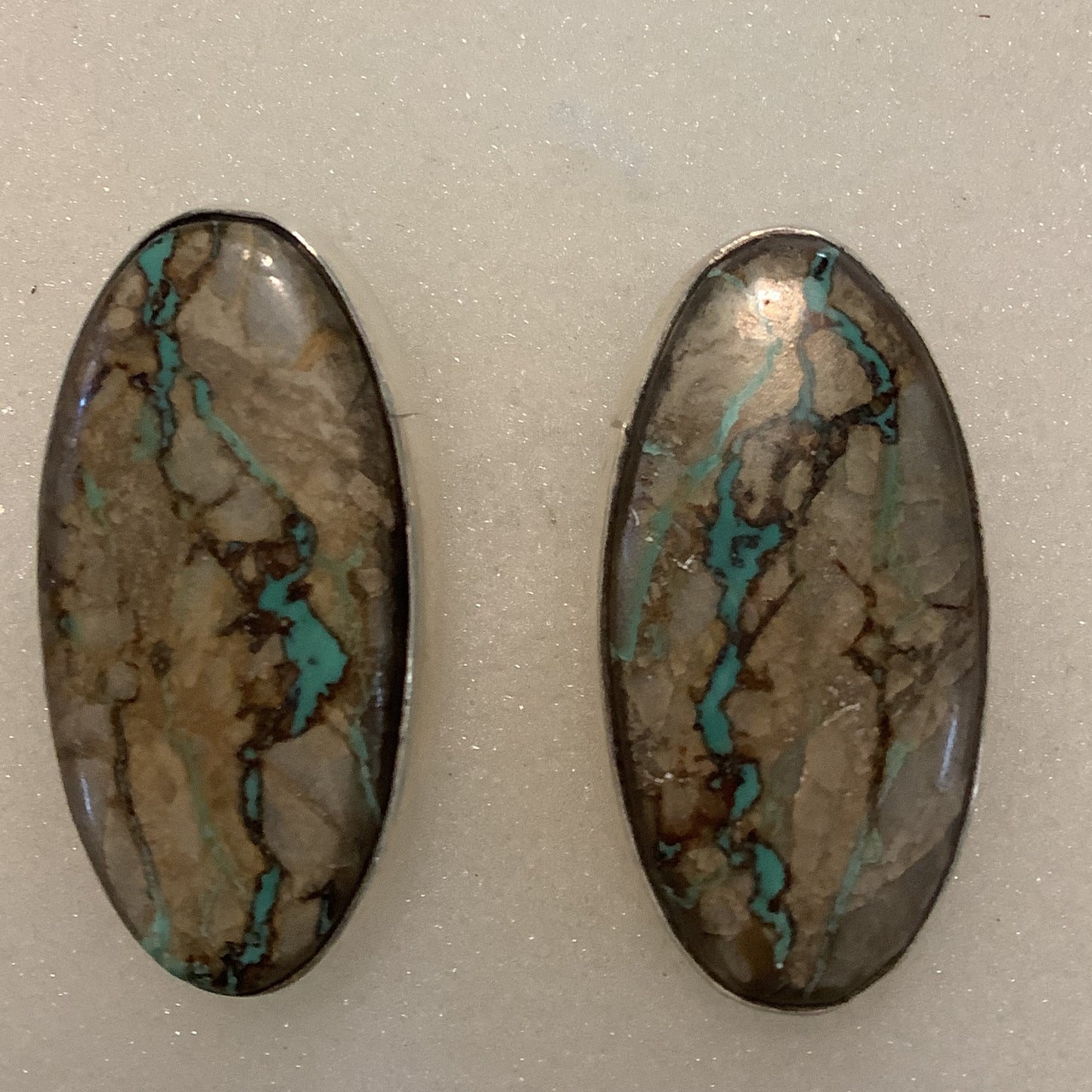 Earrings, Royston Ribbon Turquoise Cab, Oval, plain bez, stud, DD (1) crafted from Sterling Silver, an exquisite DD Earrings designed by Turquoise Mustang.
