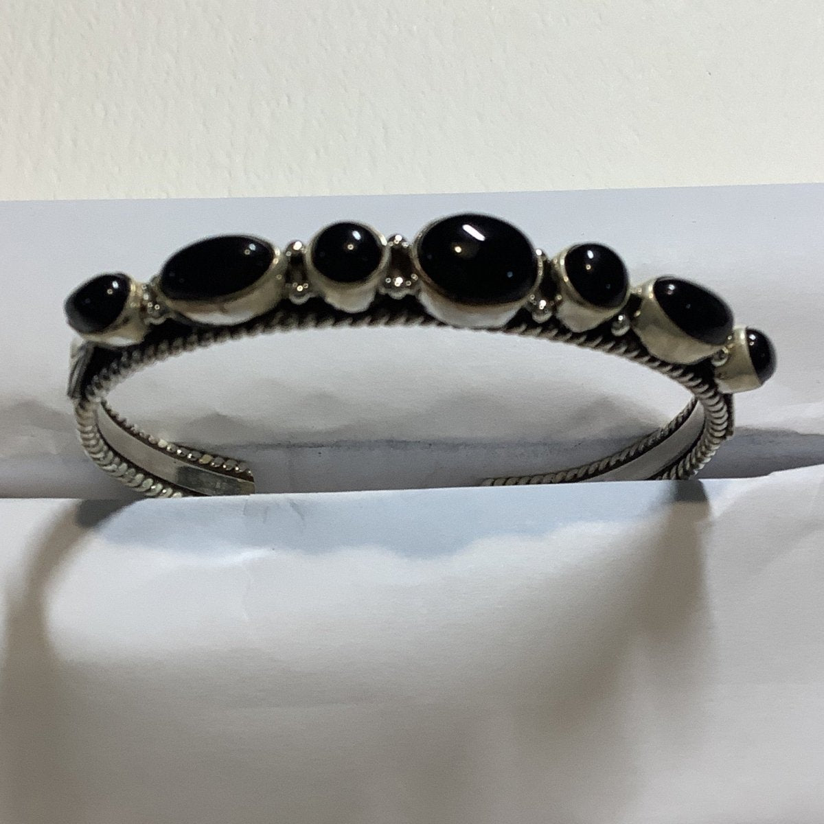 Bracelet, 7 stone Oval w Round Onyx Cuff, DD - Turquoise Mustang