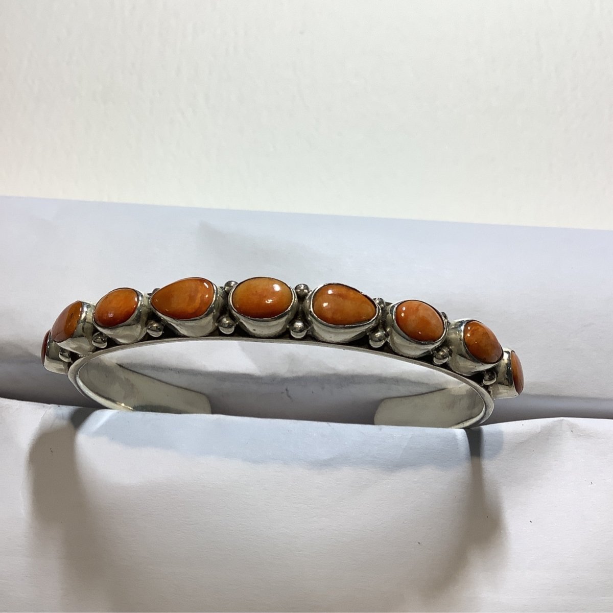 Bracelet, 9 stone Oval w Round Orange Spiny Oyster Cuff, DD - Turquoise Mustang