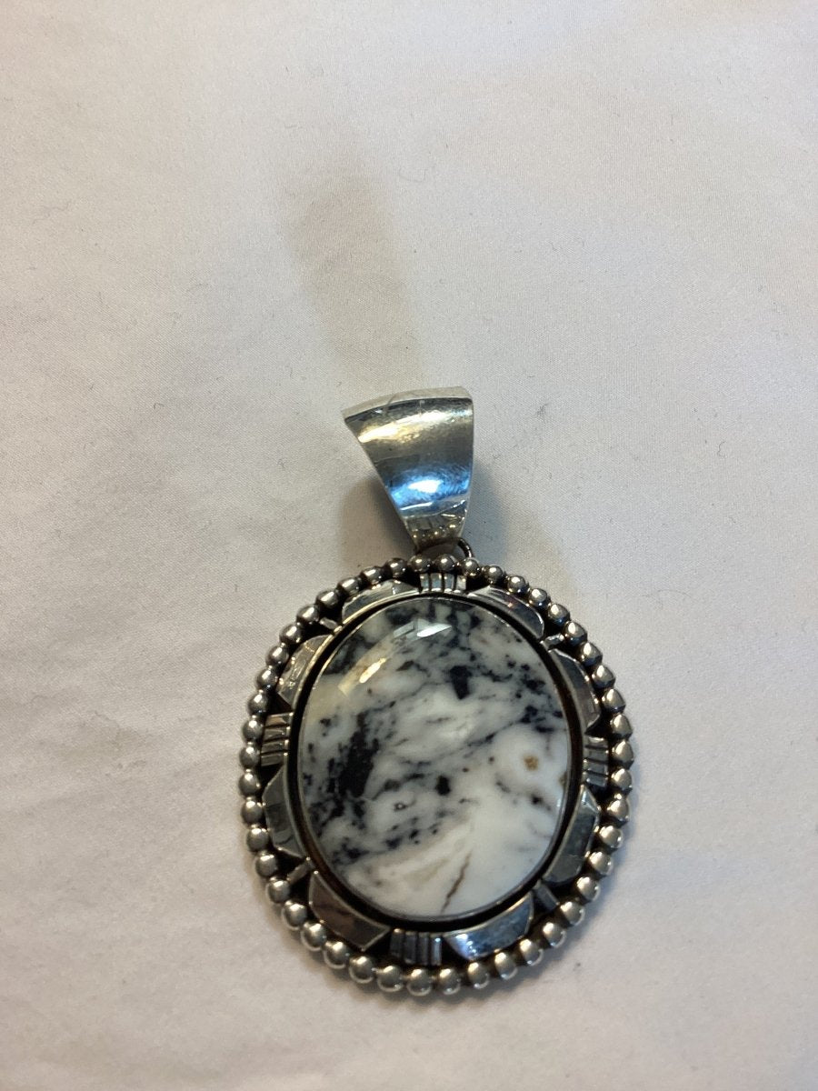 Pendant, medium Oval White Buffalo, cut bezel, beaded, Elaine Sam - Turquoise Mustang