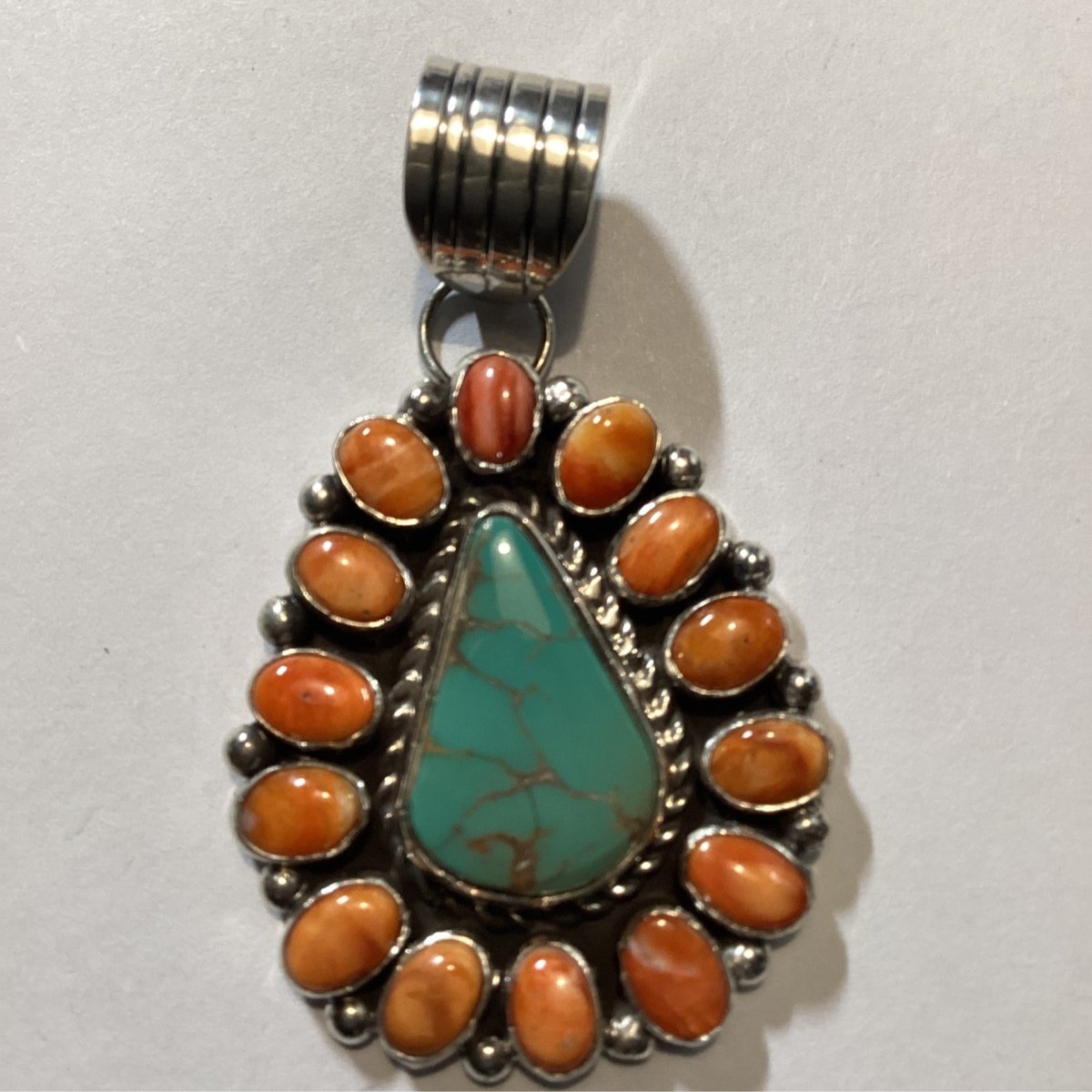 Pendant, Teardrop Pilot Mountain Turquoise with Spiny Oyster Bezel, L. Yazzie - Turquoise Mustang