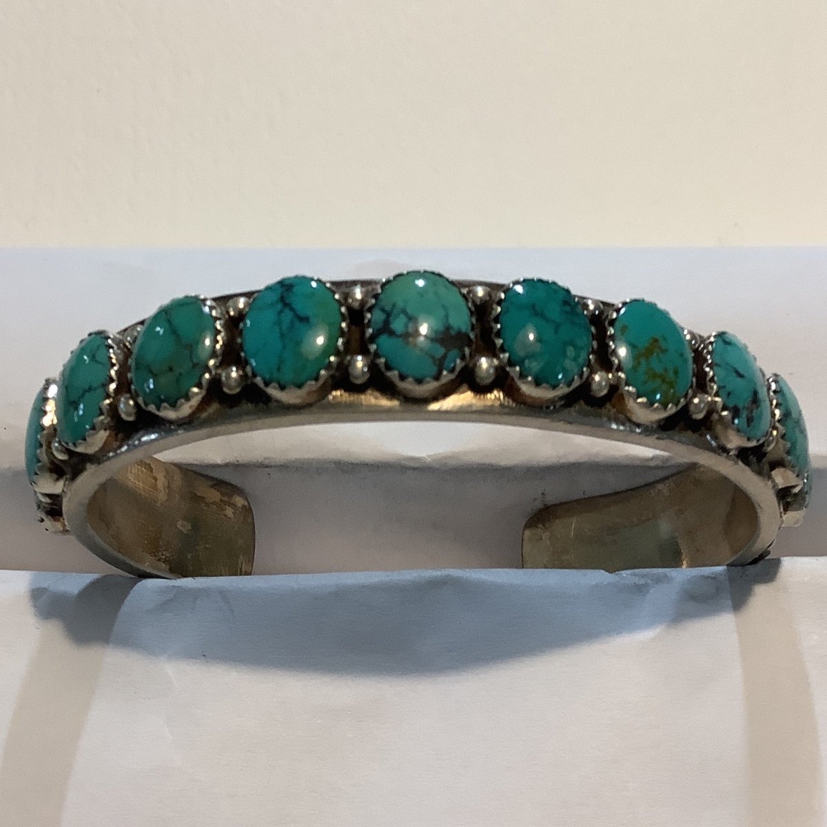 Bracelet, 12 - stone, Spiderweb Ovals, Turquoise, Man Pictograph Unknown - Turquoise Mustang