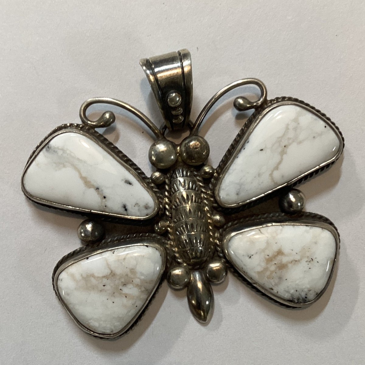 White Buffalo Butterfly Pendant with 4 - Stone Inlay by Geraldine Yazzie - Turquoise Mustang