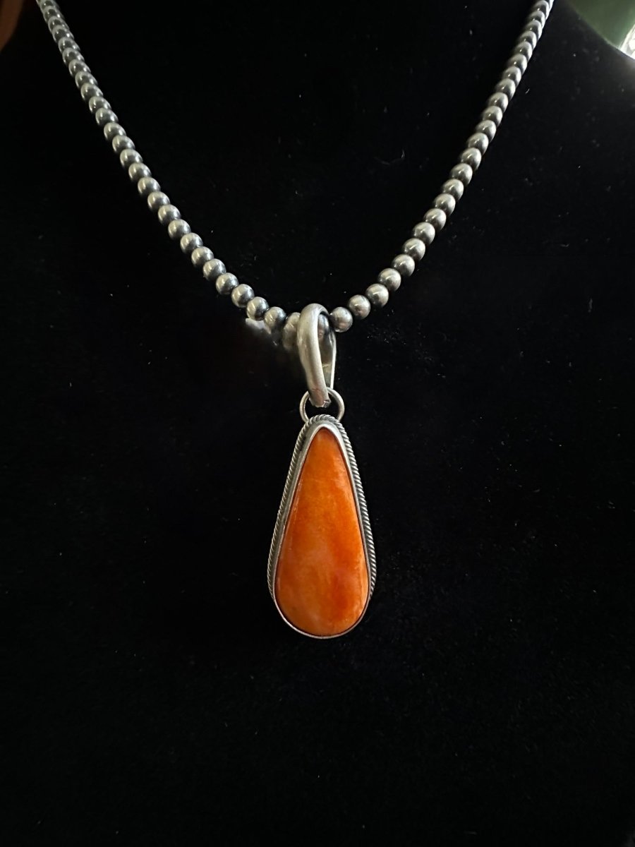 Orange Spiny Oyster Teardrop Pendant in Sterling Silver by Delbert Begay - Turquoise Mustang