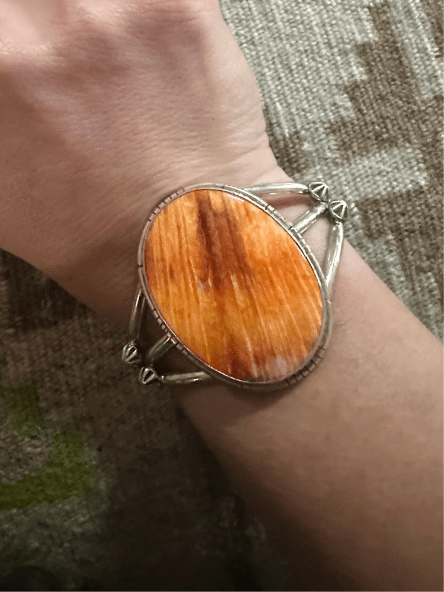Dainty Sterling Silver Cuff with Large Oval Orange Spiny Oyster Centerpiece by Sam Etsitty - Turquoise Mustang