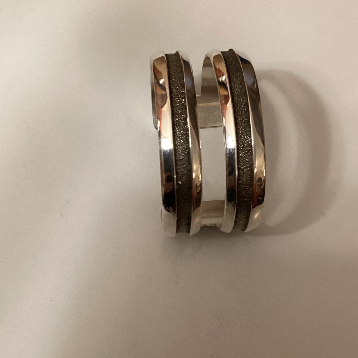 All Silver Split Racetrack Tufa Cast Cuff by Bennie Bowakaty - Turquoise Mustang