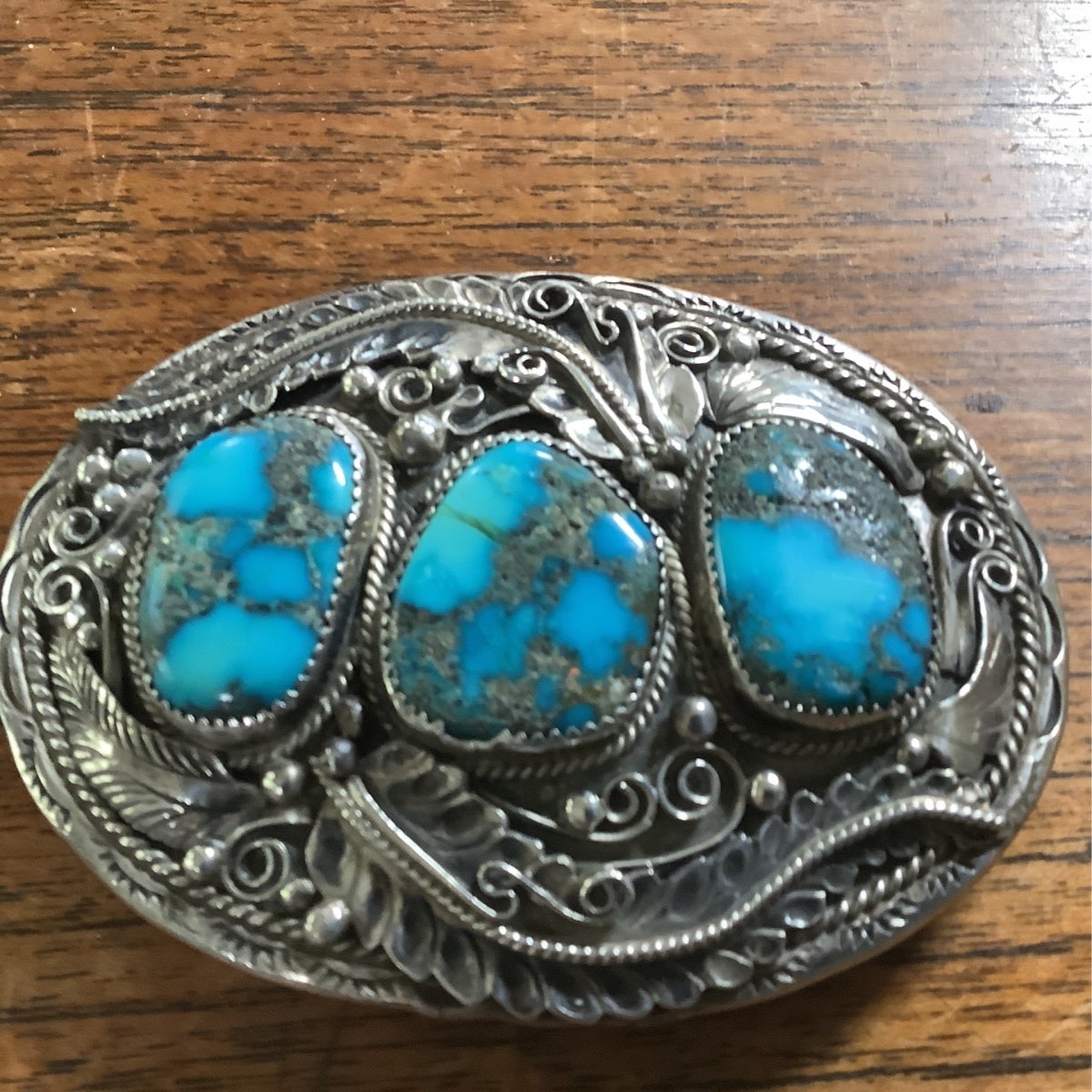 Buckle, 3 Freeform Natural Turquoise Mountain stones, feather rope scroll work, Justin Morris - Turquoise Mustang