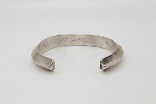 Bracelet, Early (circa 1970) heavy triangle wire, stamped cuff attributed to Tahe family - Turquoise Mustang