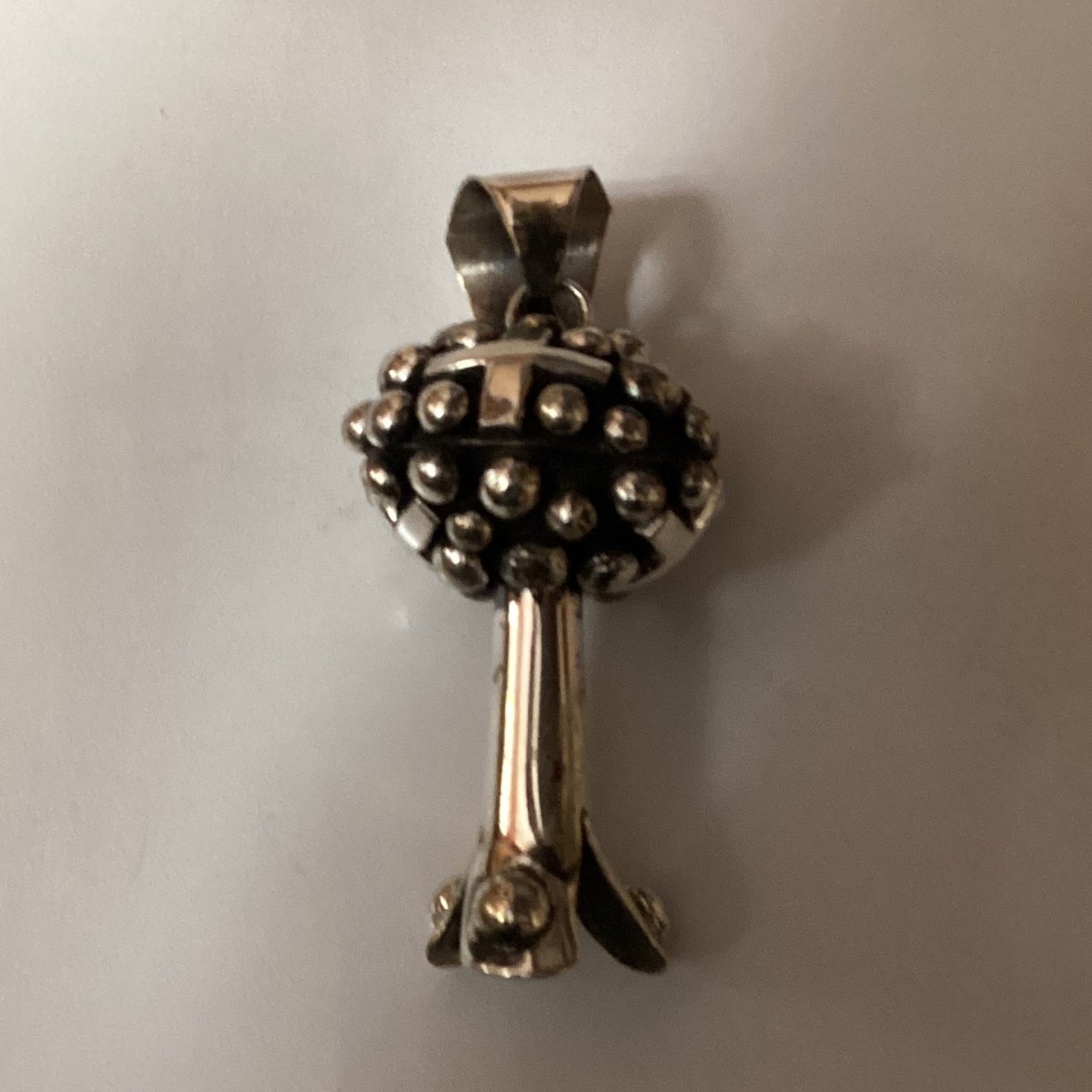 Pendant, globe style single blossom, crosses, raindrops, Chimney Butte - Turquoise Mustang