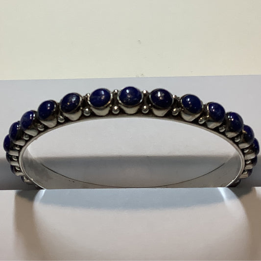 Dan Dodson Infinity Style Medium Lapis Bangle crafted from Sterling Silver, an exquisite DD Bangles designed by Turquoise Mustang.