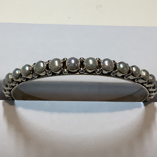 The Dan Dodson Freshwater Pearl Bangle crafted from Small, an exquisite DD Bangles designed by Turquoise Mustang.