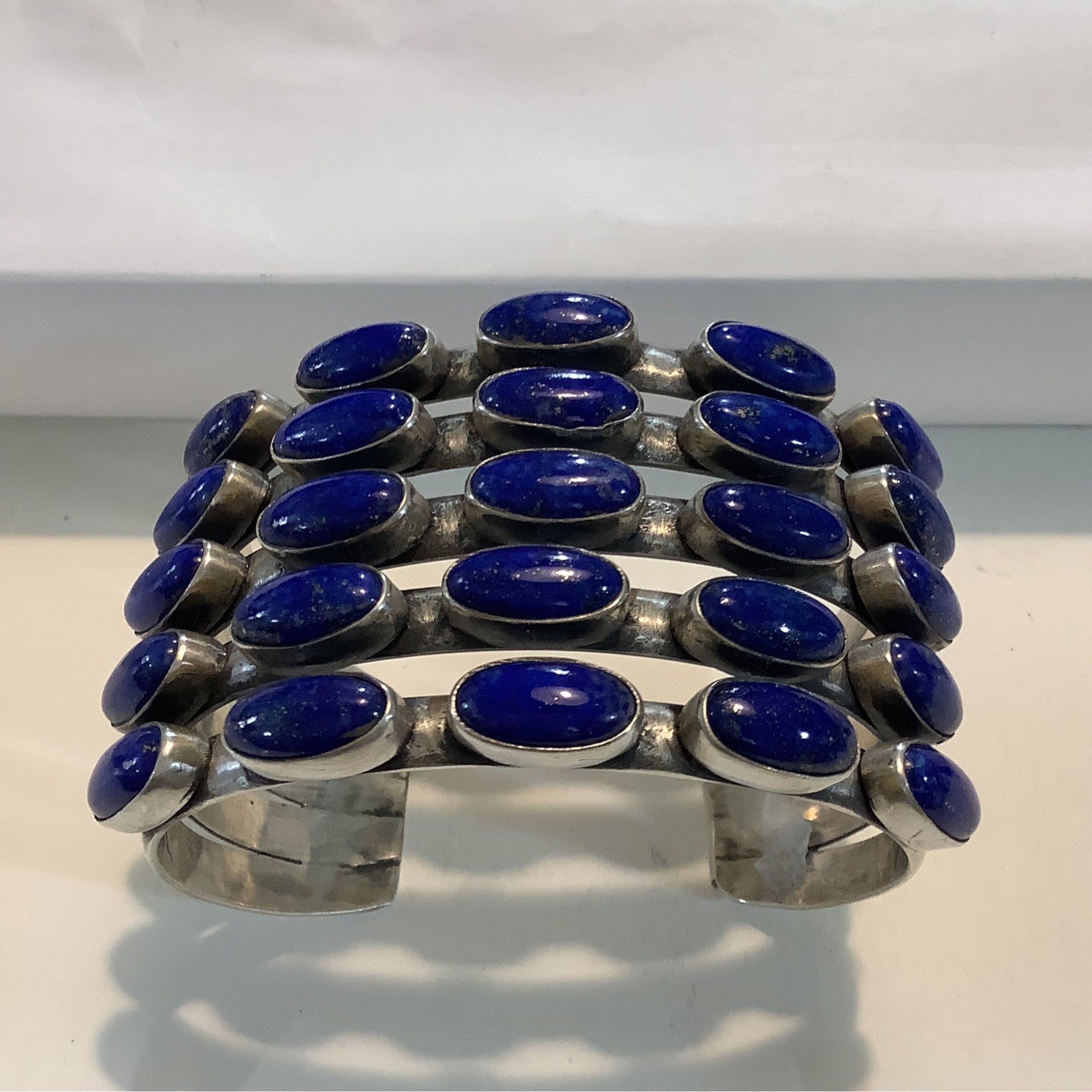 Five Row Lapis Statement Bracelet crafted from Sterling Silver, an exquisite DD Bracelets designed by Turquoise Mustang.