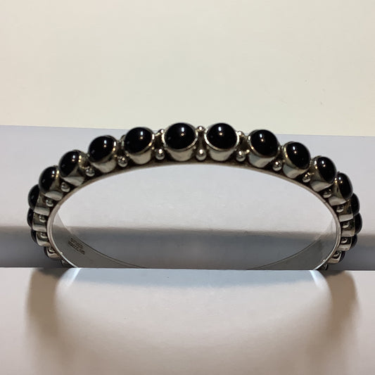 Dan Dodson Infinity-Style Medium Rounds Black Onyx Bangle crafted from Sterling Silver, an exquisite DD Bangles designed by Turquoise Mustang.