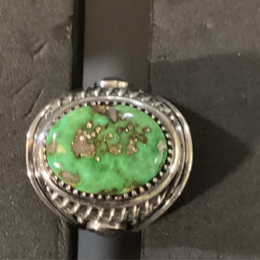 Ring, Sonoran Gold Turquoise Oval, Sawtooth Bezel with nice Filework, Derrick Gordon crafted from Sterling Silver, an exquisite Rings Native American designed by Turquoise Mustang.