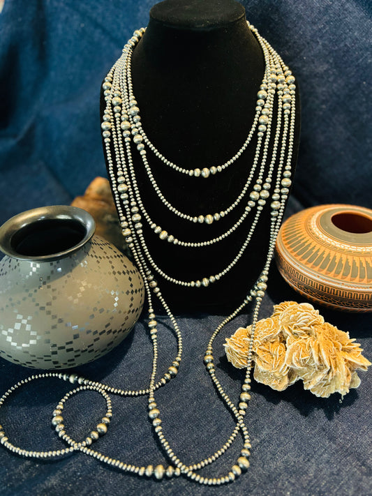 TM Infinity Graduated Round Pearl Necklace crafted from 18", an exquisite Jewelry designed by Turquoise Mustang.
