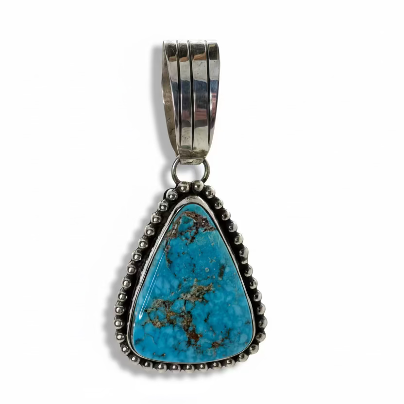 Turquoise Triangle Pendant with Raindrop Bezel by Lynn Yazzie, Navajo