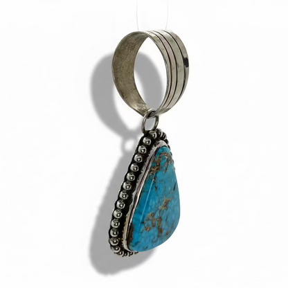 Turquoise Triangle Pendant with Raindrop Bezel by Lynn Yazzie, Navajo