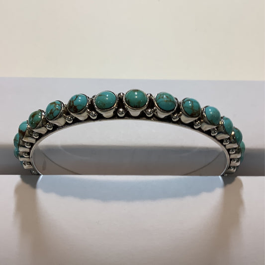 Dan Dodson Infinity-Style Medium Turquoise Bangle crafted from Sterling Silver, an exquisite DD Bangles designed by Turquoise Mustang.