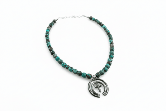 18” Cloud Mountain Barrel Bead Necklace with Oxidized Naja Pendant - Turquoise Mustang