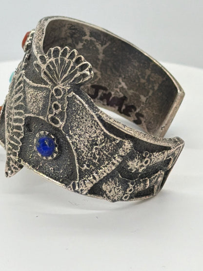 Tufa Cast Hummingbird Kachina Cuff with Cobblestone Inlay — Lester James - Turquoise Mustang