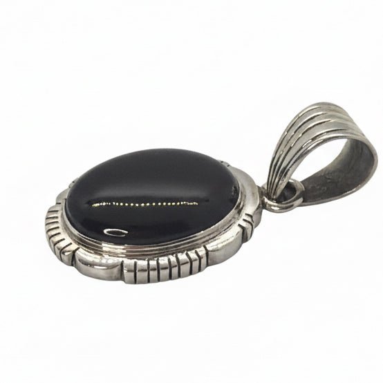 The Calendula Pendant in Black Onyx - Turquoise Mustang