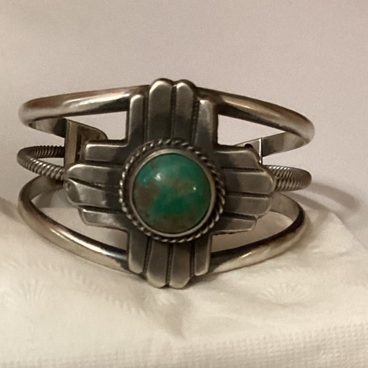 Bracelet, 3 wire, Zia Symbol, Royston center stone , Chimney Butte - Turquoise Mustang