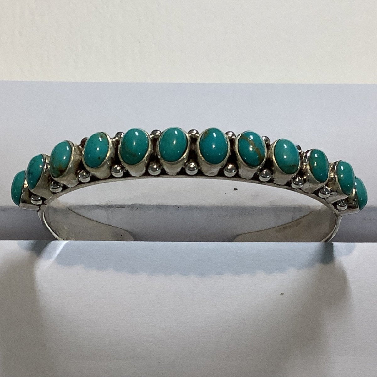Bracelet, 12 stone Oval Turquoise Cuff, DD - Turquoise Mustang
