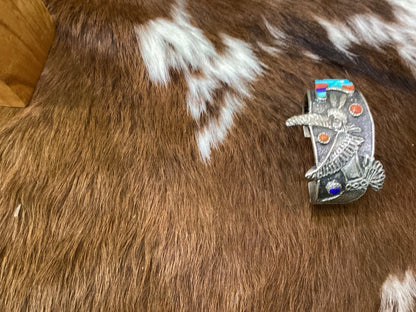 Stunning Tufa Cast with Hummingbird Kachina motif and Cobblestone inlay featuring turquoise,coral, and lapis by Lester James - Turquoise Mustang