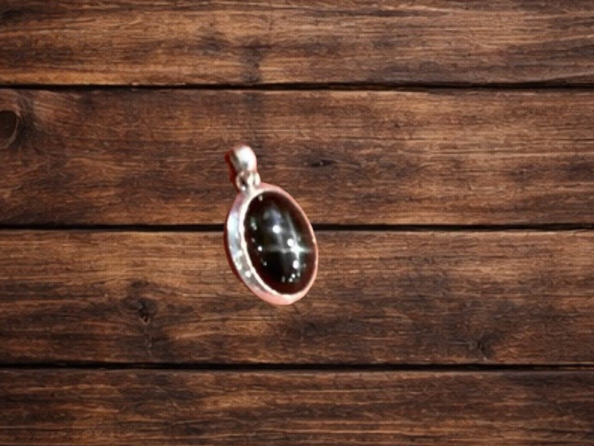 Pendant, oval, black star sapphire , 1.75” long, beveled bezel, TM - Turquoise Mustang