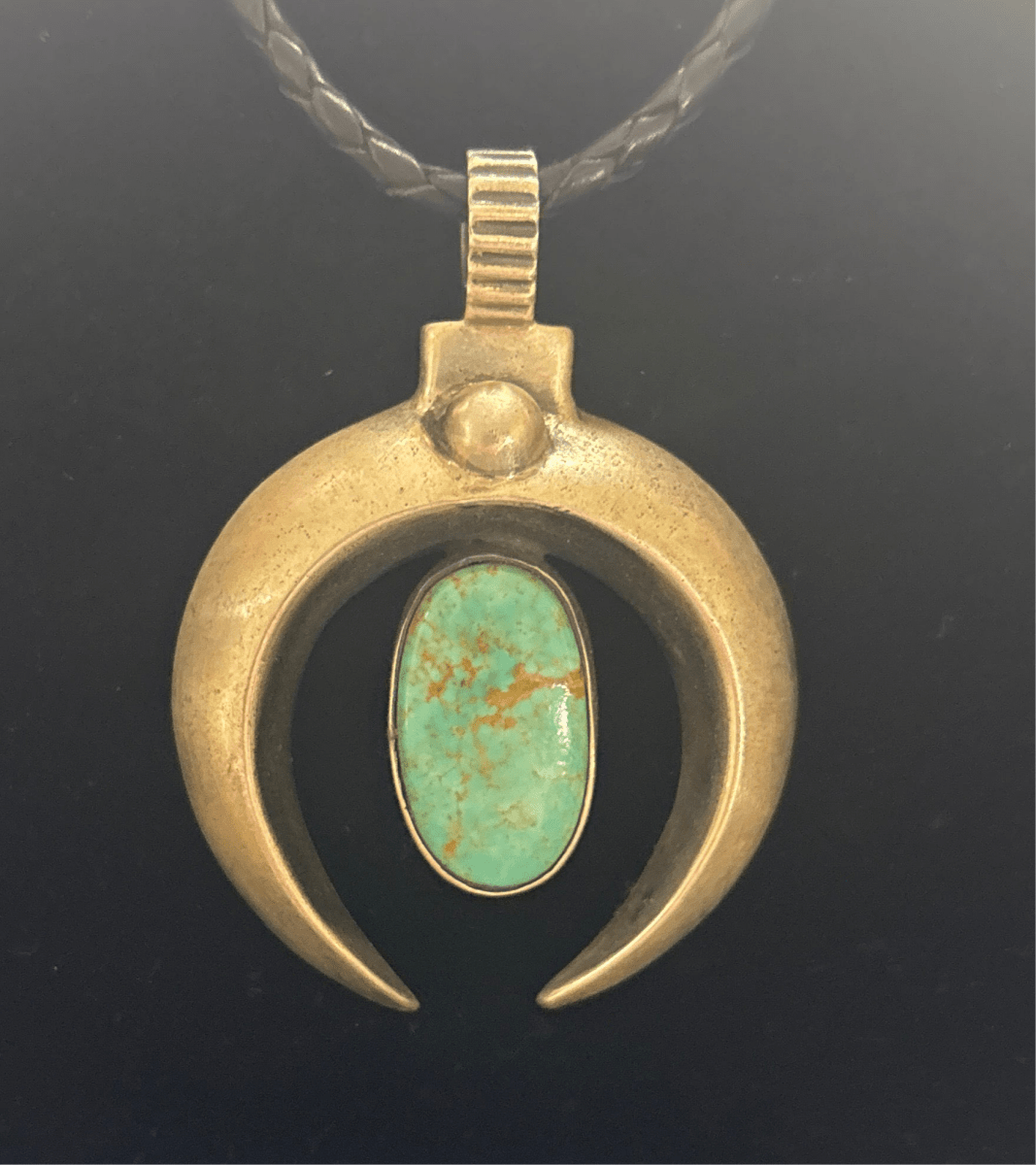 Pendant, Naja, Medium heavy cast w/ oval turquoise center stone, DD - Turquoise Mustang