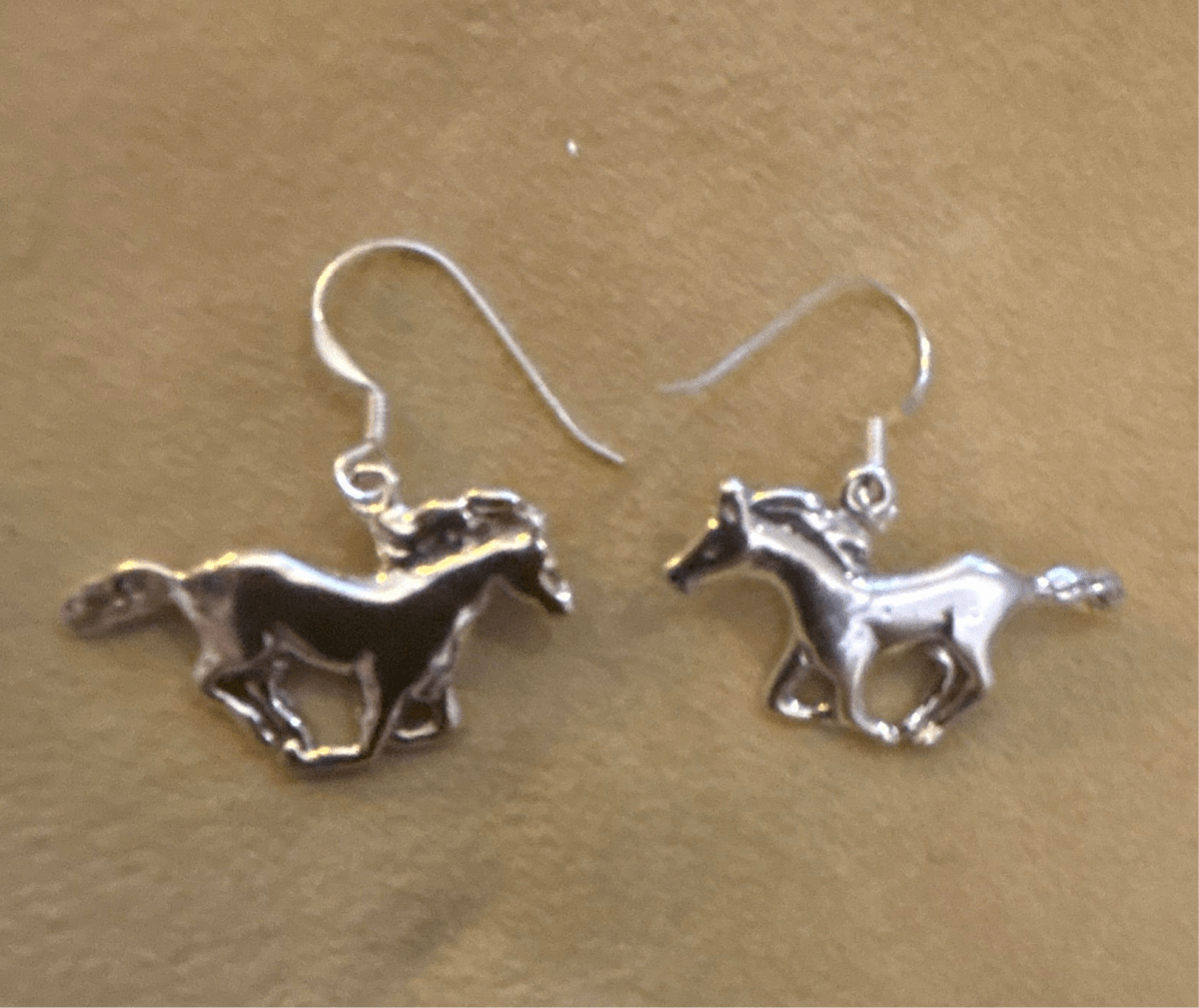 Earring, All Silver, cast mustang horses on hooks, - Turquoise Mustang