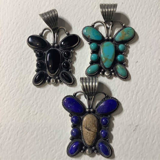 Pendant, Narrow Butterfly, 9 - stone, rope bezel, DD - Turquoise Mustang