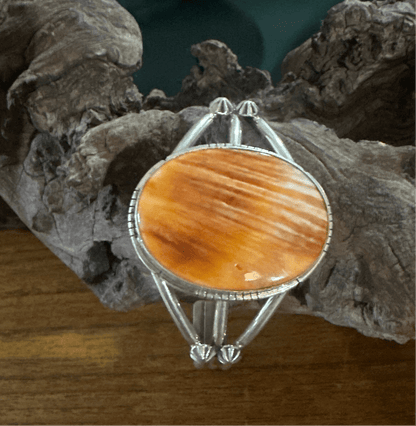Dainty Sterling Silver Cuff with Large Oval Orange Spiny Oyster Centerpiece by Sam Etsitty - Turquoise Mustang
