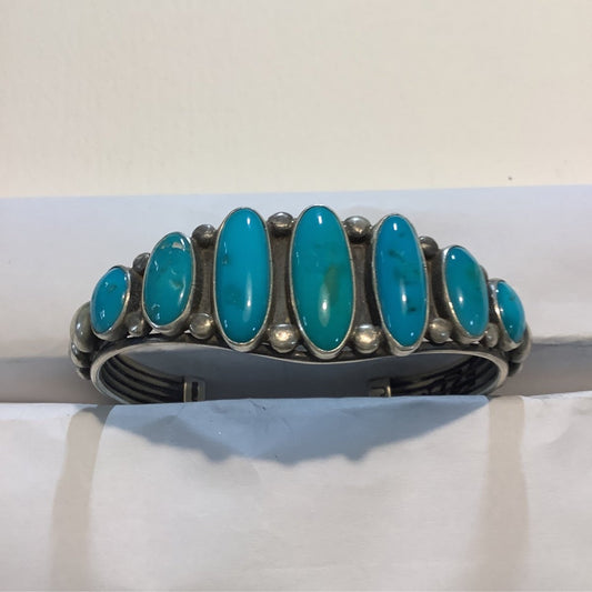 Bracelet, 7 - stone ovals, graduated, Royston Royal Blue, Nila Cook Johnson - Turquoise Mustang