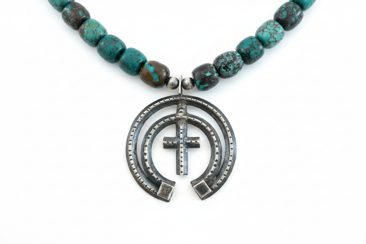 18” Cloud Mountain Barrel Bead Necklace with Oxidized Naja Pendant - Turquoise Mustang