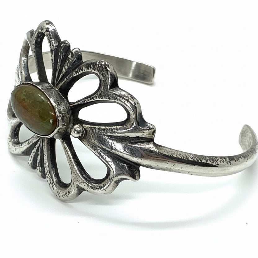 Tufa Cast Cuff With Oval Royston Turquoise center by Emma & Wilson Carviso, Jr - Turquoise Mustang