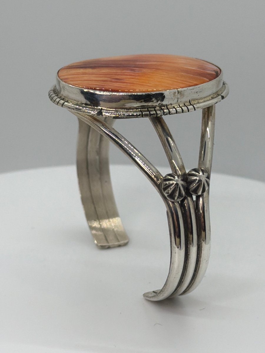Dainty Sterling Silver Cuff with Large Oval Orange Spiny Oyster Centerpiece by Sam Etsitty - Turquoise Mustang
