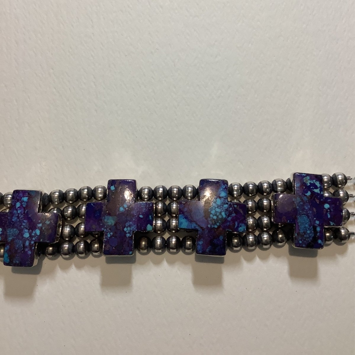 Bracelet, Navajo Pearl, 4 - strand, 5 Mojave Turquoise crosses, DD - Turquoise Mustang