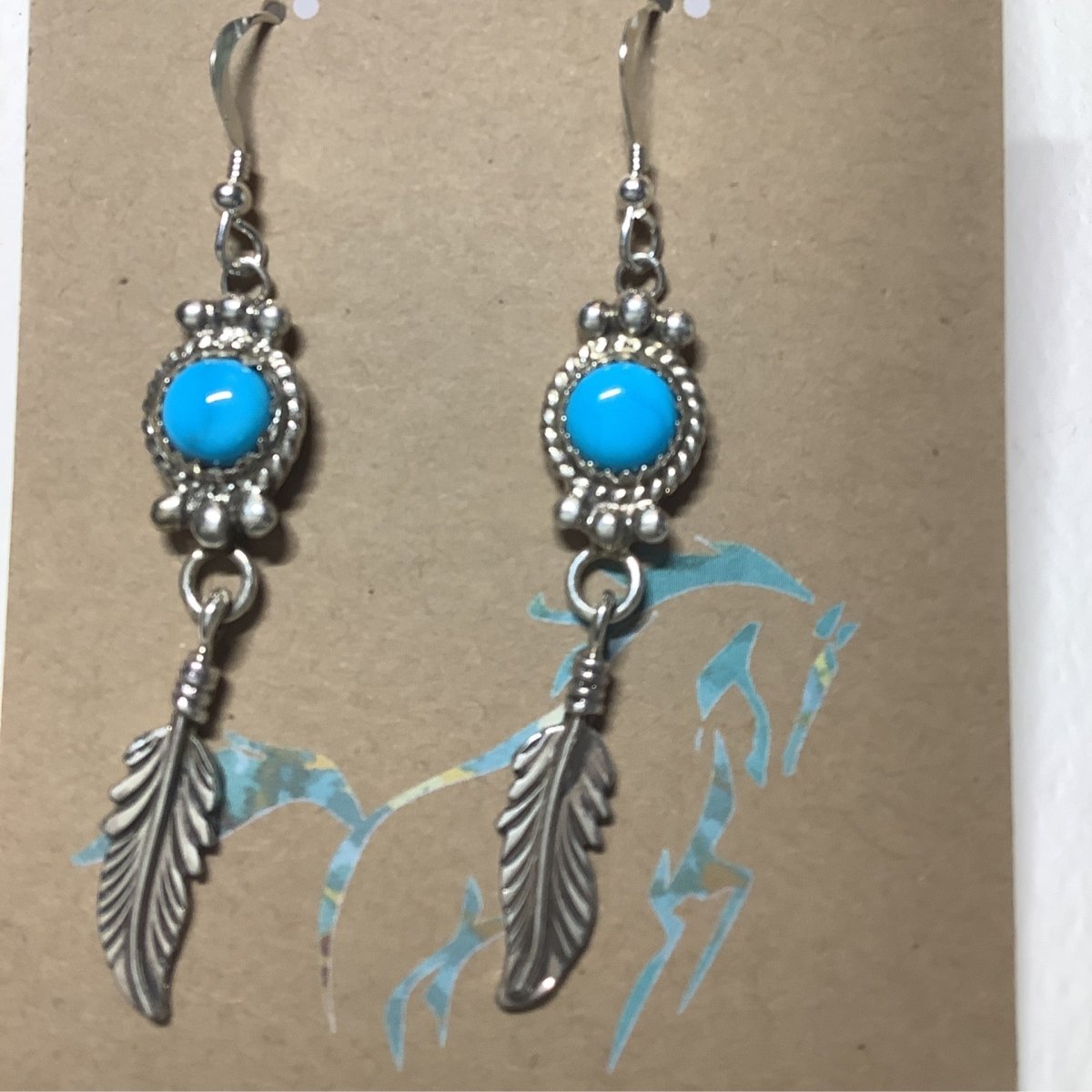 Earring, dangles w rd. SB cab, rope bezel and feather, unknow - Turquoise Mustang