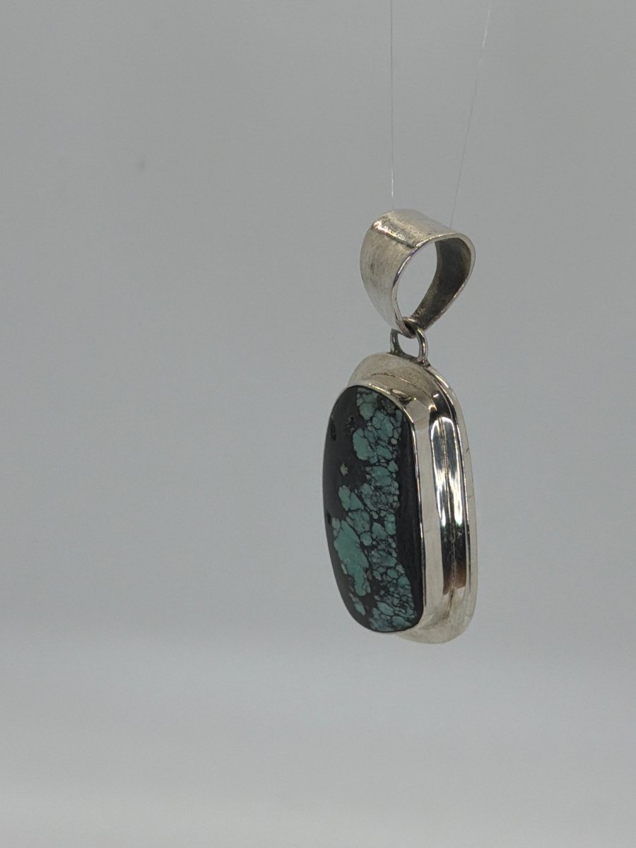 Polychrome Cloud Mountain Turquoise Freeform Pendant by Darryl Becenti - Turquoise Mustang