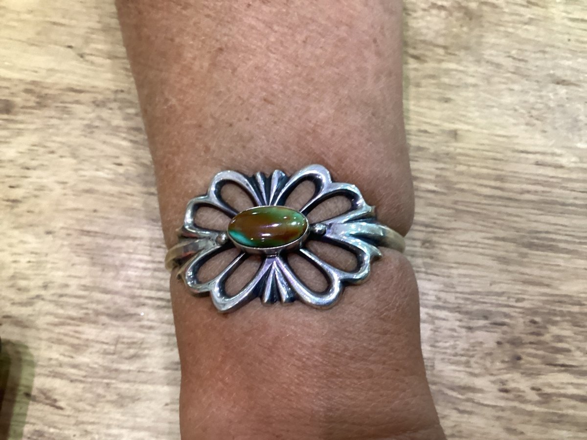 Tufa Cast Cuff With Oval Royston Turquoise center by Emma & Wilson Carviso, Jr - Turquoise Mustang