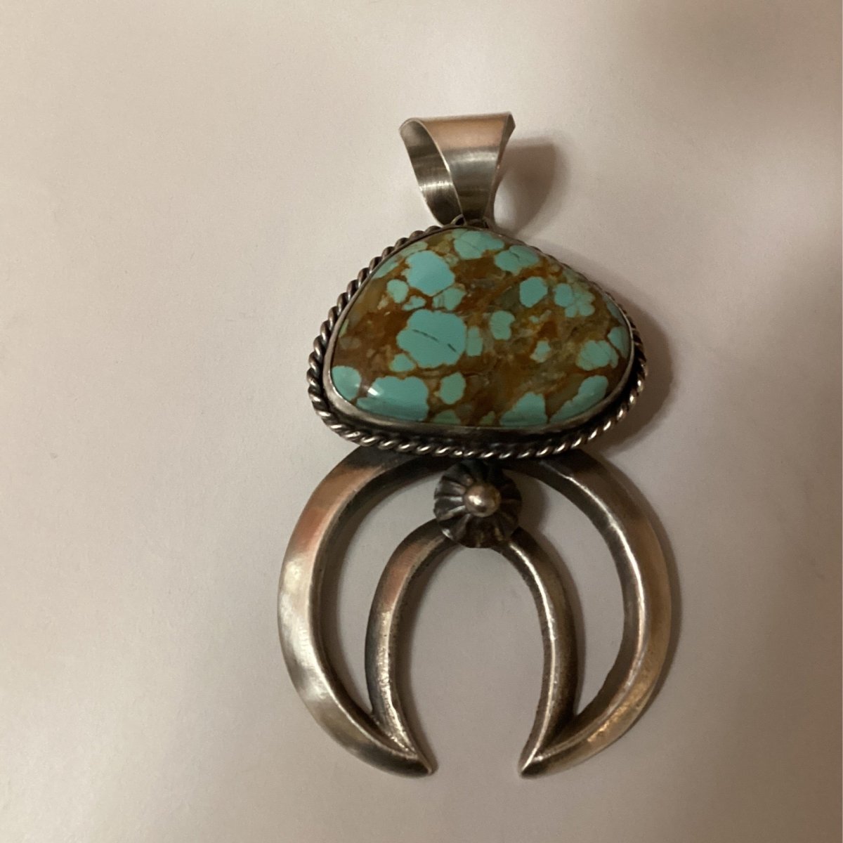Pendant, giant naja with freeform 8, rope bezel, Chimney Butte - Turquoise Mustang
