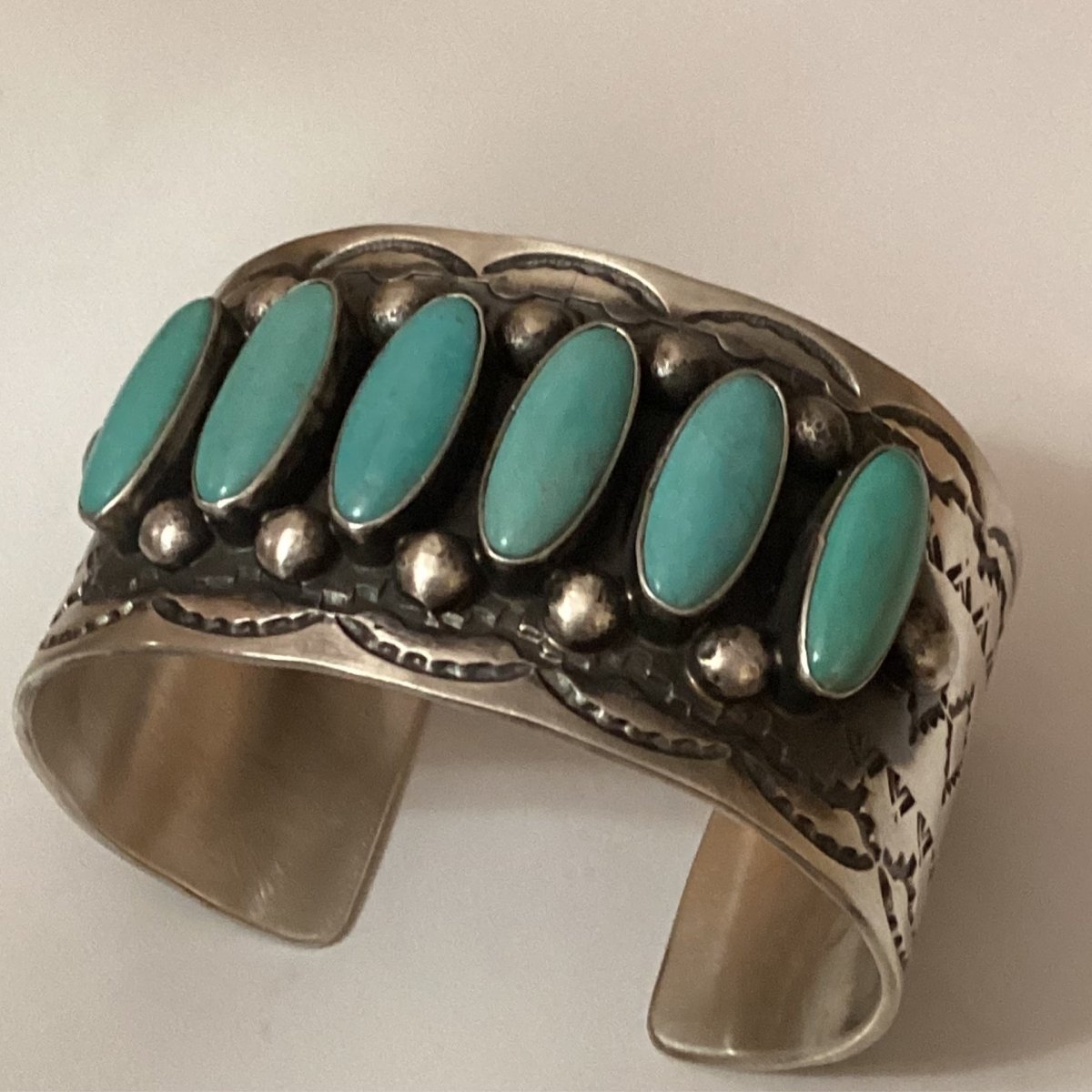Bracelet, Wide Stamped Silver cuff with 6 narrow ovals Kingman , Chimney Butte - Turquoise Mustang