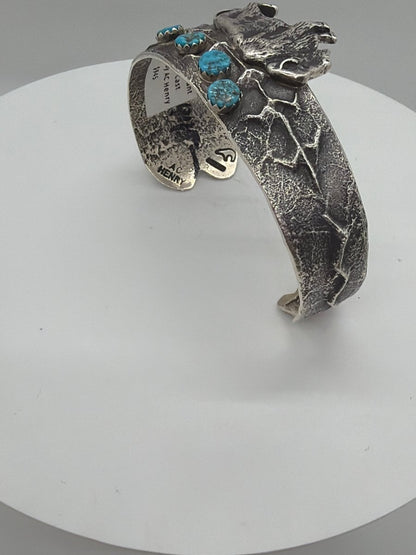 Tufa Cast Sterling Silver Cuff Bracelet with Bison and Corn Motif, by AC Henry - Turquoise Mustang