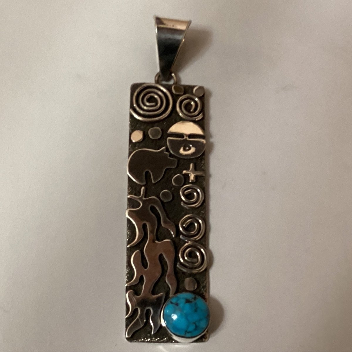 Alex Sanchez Sterling Silver Petroglyph Pendant with Round Turquoise Cabachon - Turquoise Mustang