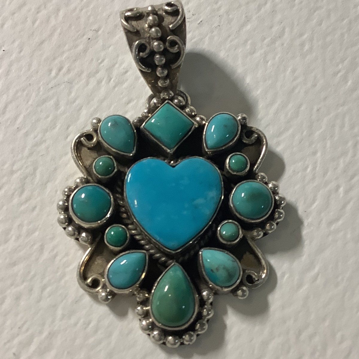 Pendant, Heart, Small Kingman Turquoise Heart Cab w/ 12 mixed shape TQ accents, DD - Turquoise Mustang
